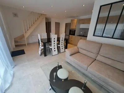 Coin salon dans l'établissement Gites des falaises de Longues 6personnes