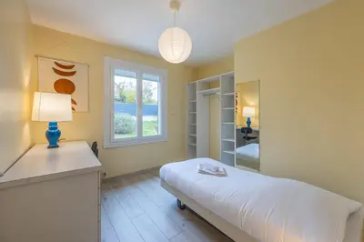 Un ou plusieurs lits dans un hébergement de l'établissement Le Nest quiet house in city center