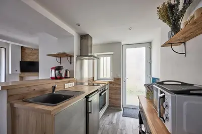 Cuisine ou kitchenette dans l'établissement La Maison du Pêcheur - A 250 m de la plage