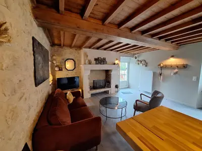 Télévision ou salle de divertissement dans l'établissement Le p'tit bénété