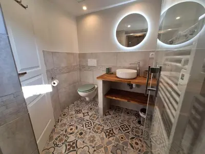 Salle de bains dans l'établissement Le p'tit bénété