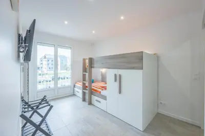 Un ou plusieurs lits dans un hébergement de l'établissement La Vigie des Ours - Appt proche de la plage