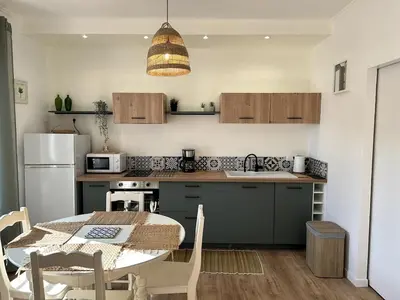 Cuisine ou kitchenette dans l'établissement Appartement de la plage