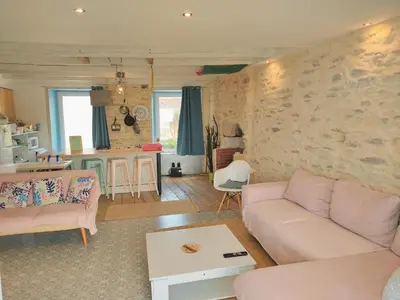 Coin salon dans l'établissement Vue mer Loft Wifi TV Holidays