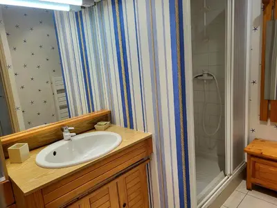Salle de bains dans l'établissement Villa front de mer les Cordylines