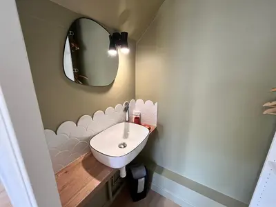 Salle de bains dans l'établissement L'Ecrin de Famille Maison Mer & Bourg Gold Beach