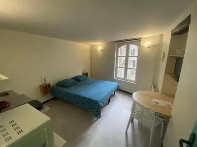 Un ou plusieurs lits dans un hébergement de l'établissement Appartement ou chambre centre cherbourg