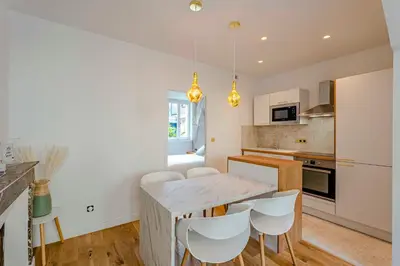 Cuisine ou kitchenette dans l'établissement Petit Appartement Cosy proche Centre historique