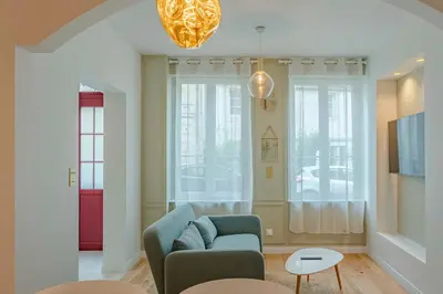 Coin salon dans l'établissement Petit Appartement Cosy proche Centre historique