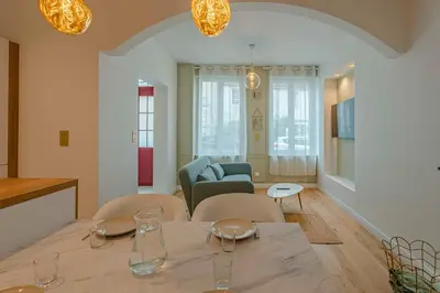 Coin salon dans l'établissement Petit Appartement Cosy proche Centre historique