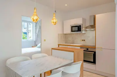 Cuisine ou kitchenette dans l'établissement Petit Appartement Cosy proche Centre historique