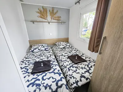 Un ou plusieurs lits dans un hébergement de l'établissement Evasion Normande
