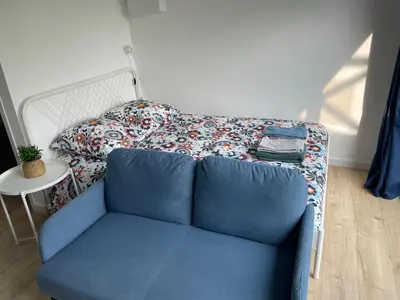 Coin salon dans l'établissement Studio situé entre Caen & Bayeux et la mer