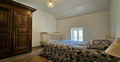 Un ou plusieurs lits dans un hébergement de l'établissement Maison Saint Côme du Mont