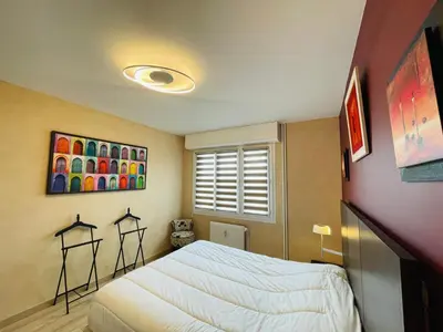 Un ou plusieurs lits dans un hébergement de l'établissement Yucca, Appartement avec garage privé et balcon