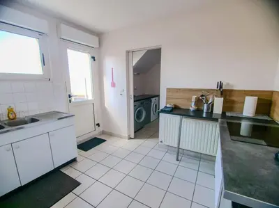 Cuisine ou kitchenette dans l'établissement Appartement terrasse
