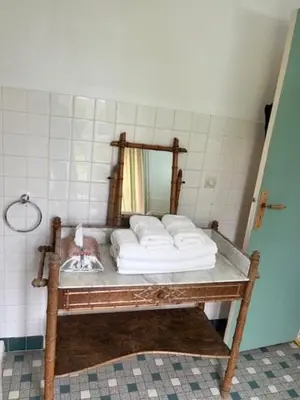 Un ou plusieurs lits dans un hébergement de l'établissement Château de Goville