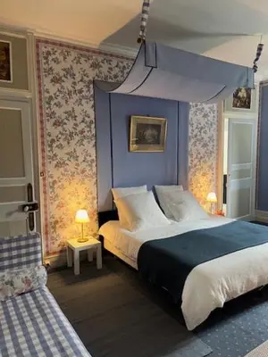 Un ou plusieurs lits dans un hébergement de l'établissement Château de Goville