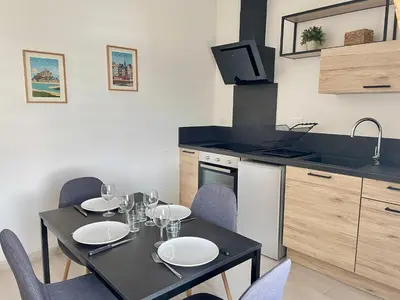 Cuisine ou kitchenette dans l'établissement Le 449 - Collection La 21ème Planche