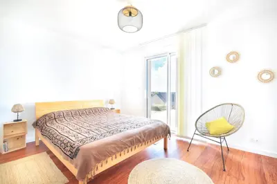 Un ou plusieurs lits dans un hébergement de l'établissement Les Euphorbes - Charmante maison avec vue mer