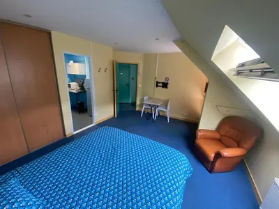 Un ou plusieurs lits dans un hébergement de l'établissement les moulins - chambre 1