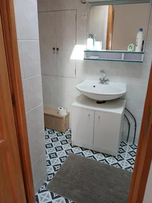 Salle de bains dans l'établissement Studio neuf et équipé bord de mer
