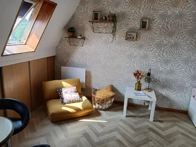 Coin salon dans l'établissement Studio neuf et équipé bord de mer