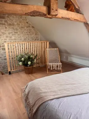 Un ou plusieurs lits dans un hébergement de l'établissement Le Cottage d'Emmy - Rose