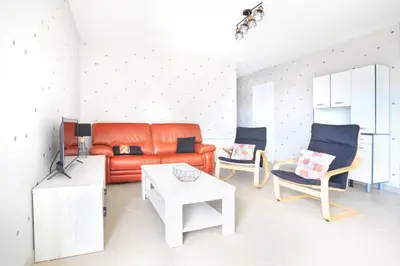 Coin salon dans l'établissement Un tour dans la Manche - A 500 m de la plage