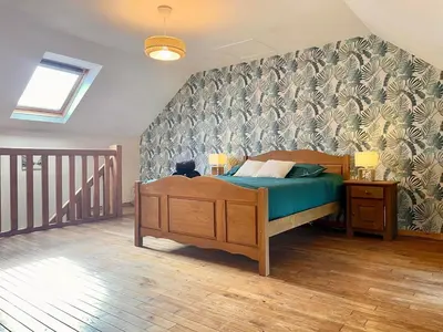 Un ou plusieurs lits dans un hébergement de l'établissement Maison de pays proche de la mer