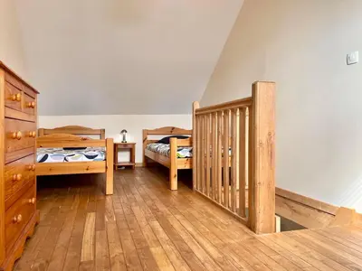 Un ou plusieurs lits dans un hébergement de l'établissement Maison de pays proche de la mer