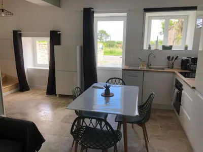 Cuisine ou kitchenette dans l'établissement La Saint Comienne