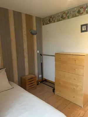 Un ou plusieurs lits dans un hébergement de l'établissement Maison de vacances 5 voyageurs