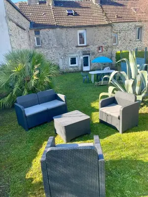 Jardin de l'établissement Maison de vacances 5 voyageurs