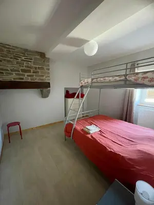 Un ou plusieurs lits dans un hébergement de l'établissement Gîte à la campagne