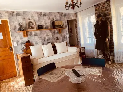 Un ou plusieurs lits dans un hébergement de l'établissement Appartement MUSÉE Le JOUR-J