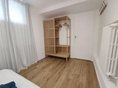 Un ou plusieurs lits dans un hébergement de l'établissement Suite parentale indépendante en ville - chez l'habitant