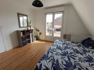 Un ou plusieurs lits dans un hébergement de l'établissement Grand Bleu de Courseulles