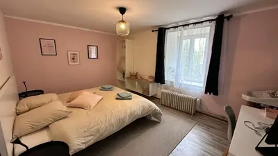 Un ou plusieurs lits dans un hébergement de l'établissement Domaine Les Fontaines