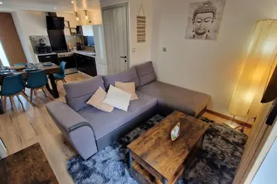 Coin salon dans l'établissement Logement entier Mont-Saint-Michel