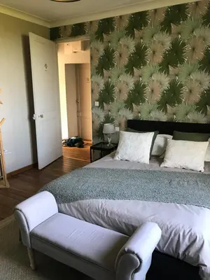 Un ou plusieurs lits dans un hébergement de l'établissement Chambres d'hôtes de la baie