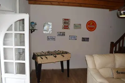 Coin salon dans l'établissement Hameau Des Gardes