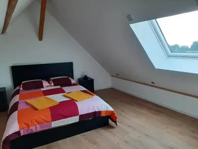 Un ou plusieurs lits dans un hébergement de l'établissement Duplex avec vue sur mer-La Rose des Vents