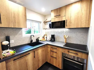 Cuisine ou kitchenette dans l'établissement Maison des Palmiers - Bord de mer et campagne