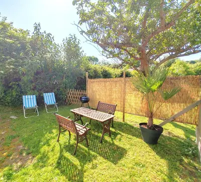 Jardin de l'établissement Maison des Palmiers - Bord de mer et campagne