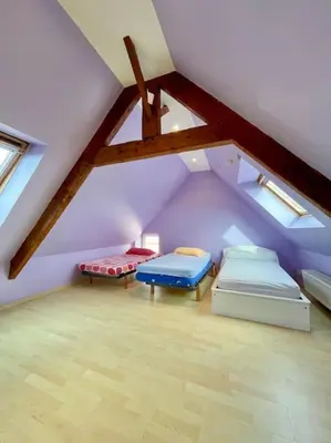 Un ou plusieurs lits dans un hébergement de l'établissement Maison de campagne à la mer