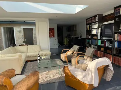 Coin salon dans l'établissement Appartement charmant et élégant de centre ville