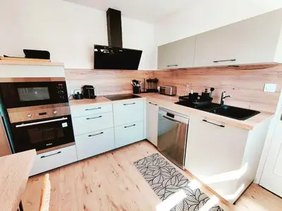 Cuisine ou kitchenette dans l'établissement Les Embruns Charmante maison A 50m de la plage