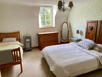 Un ou plusieurs lits dans un hébergement de l'établissement Chambre de Rose - Le Refuge des Parachutistes - en bordure du marais