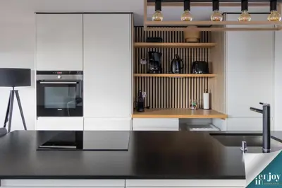 Cuisine ou kitchenette dans l'établissement Logis Lina